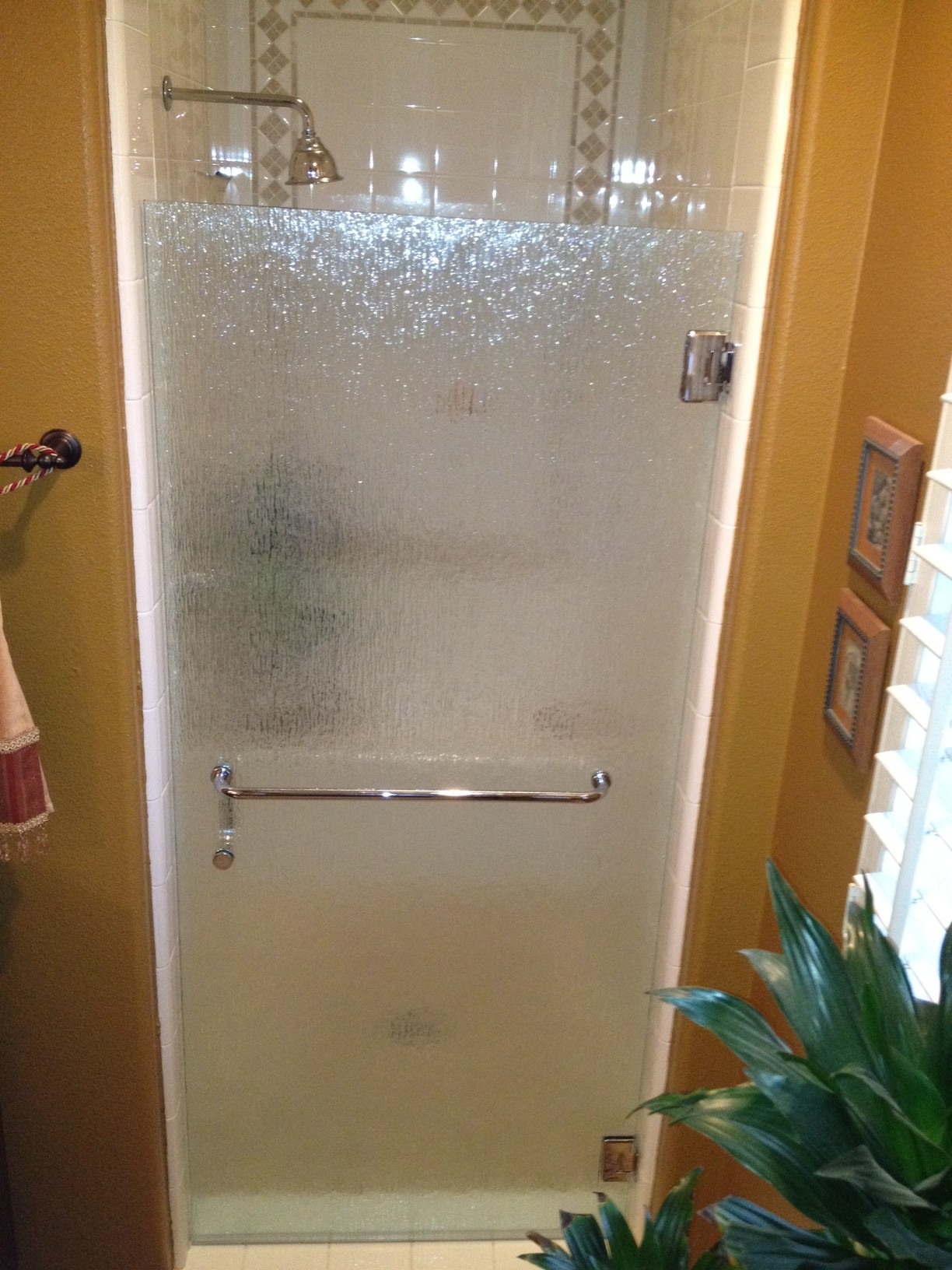 OnTrack installs and replaces shower doors