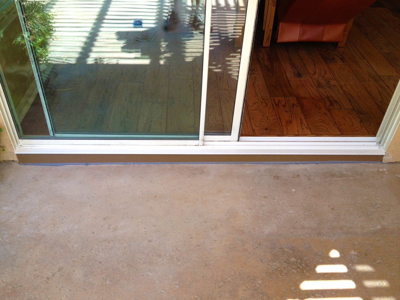 Sliding Door Track Repair San Diego - After 4 - New track and synthetic paint grade lumber sub support in place of that poor stucco installation ads a nice look and helps ensure there's no further corrosion to the new track.