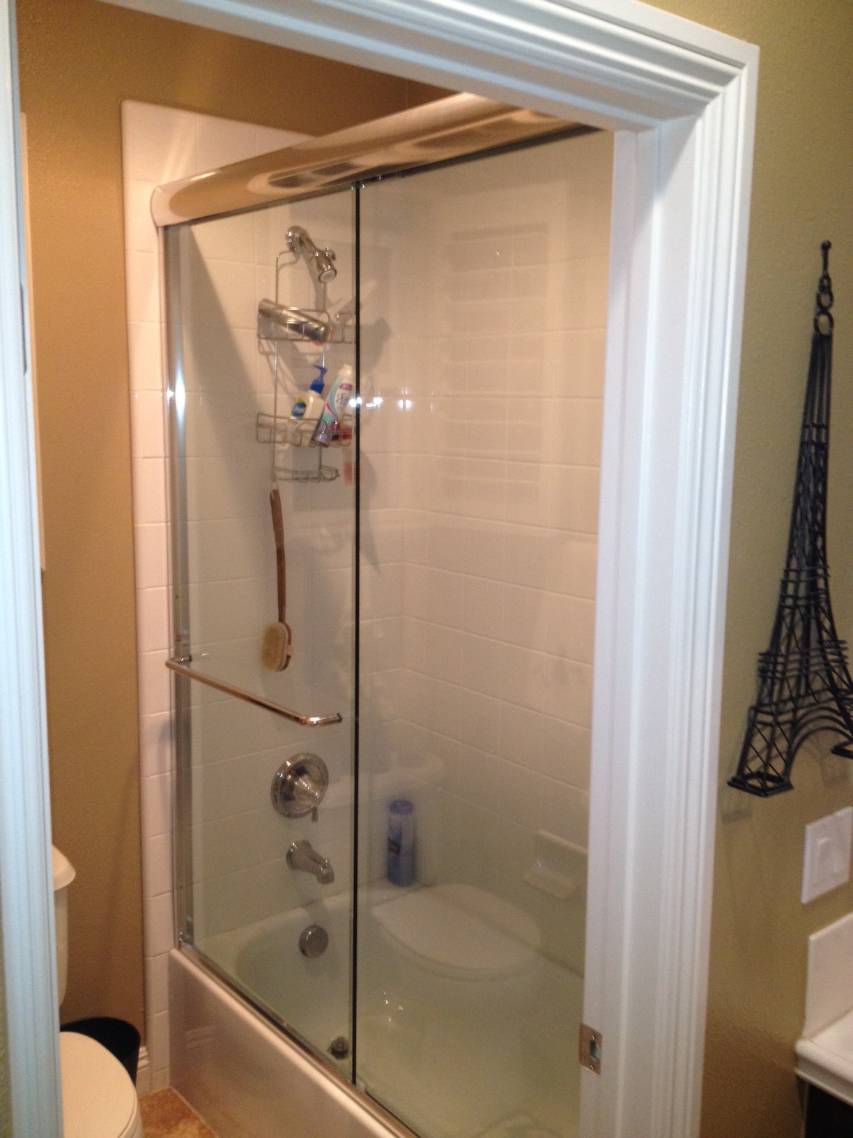 OnTrack installed a new glass shower door in this bathroom